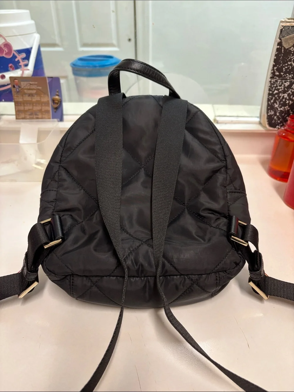 kate spade Black Quilted Nylon Mini Backpack with Gold Accents*